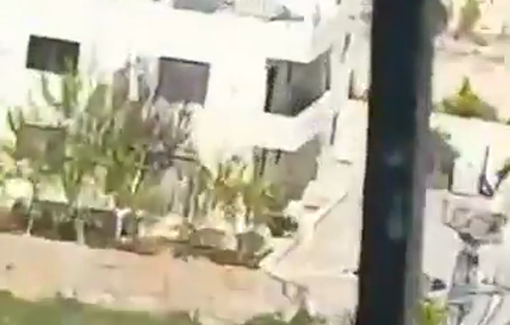 Thumbnail preview image for the video titled: Israeli bulldozer demolishing a horse barrack and a cave in Issawiya