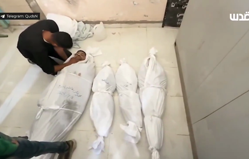 Thumbnail preview image for the video titled: At the morgue of the Indonesian hospital following the massacre at UNWRA clinic