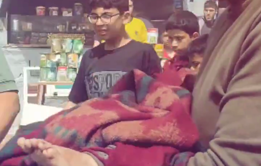 Thumbnail preview image for the video titled: Civilians carry four children killed in Israeli bombing of UNRWA clinic