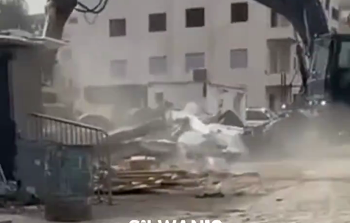 Thumbnail preview image for the video titled: Israeli excavator demolishing a Palestinian horse barn in Beit Hanina in occupied Jerusalem