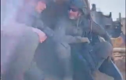 Thumbnail preview image for the video titled: Israeli soldiers using Doosan Excavator bucket to find tunnels