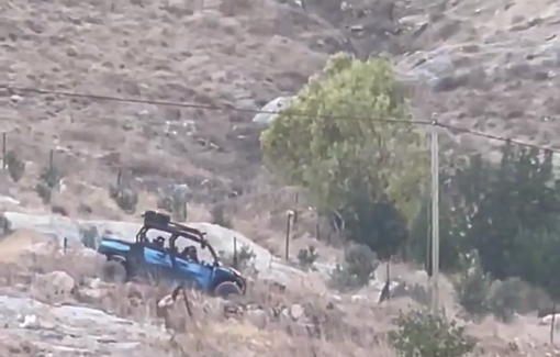 Thumbnail preview image for the video titled: Settlers and Israeli soldiers seize a farmer's excavator in the Jordan Valley