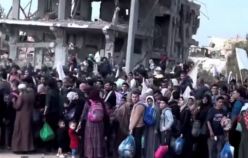 Thumbnail preview image for the video titled: A soldier from combat engineer corps films silent Palestinians as they’re forced down the displacement corridor.