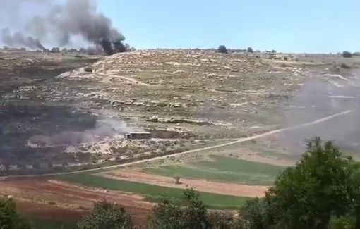 Thumbnail preview image for the video titled: Israeli Settlers attacking Sinjil near Ramallah burning homes and stealing livestock