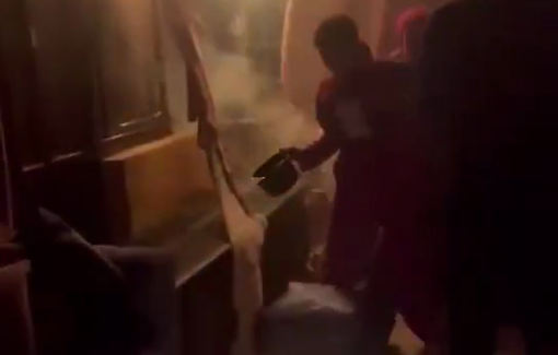 Thumbnail preview image for the video titled: Family is trying to put out a fire that is burning their home in Sinjil, as a result of a settlers attack