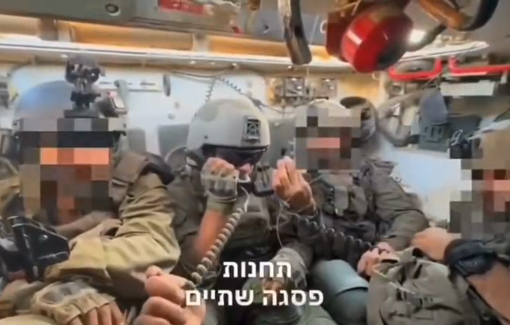 Thumbnail preview image for the video titled: Iden Amedi (Israeli singer and actor) blowing up a civilian building in Gaza