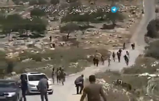 Thumbnail preview image for the video titled: Extremist Israeli settlers storming the village of Al-Mughayyir
