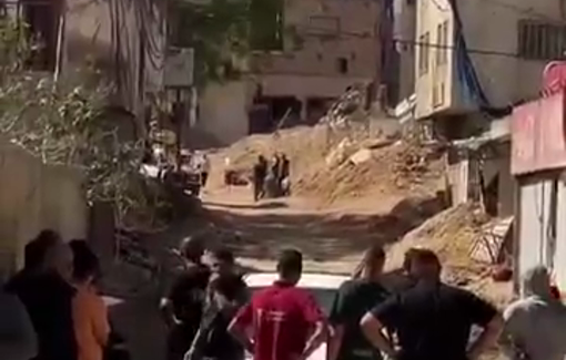 Thumbnail preview image for the video titled: Residents of Nur Shams R.C. retrieving some of their belongings from their homes before being demolished