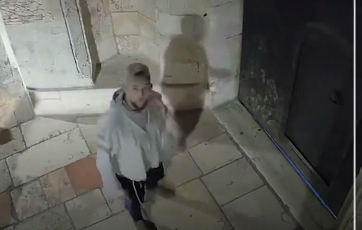 Thumbnail preview image for the video titled: An Israeli settler captured on a CCTV camera spitting at the gate of an Armenian church in East Jerusalem