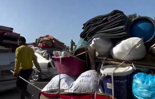 Thumbnail preview image for the video titled: Harrowing footage of Palestinians forced to evacuate amid ongoing devastation.