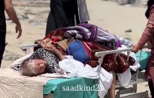 Thumbnail preview image for the video titled: Companions take the the sick and injured out of the Indonesian hospital as Israel pounds the area