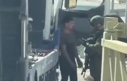 Thumbnail preview image for the video titled: Israeli soldiers aggressively assaulted a Palestinian youth at the entrance to Al-Bitah town in Ramallah,