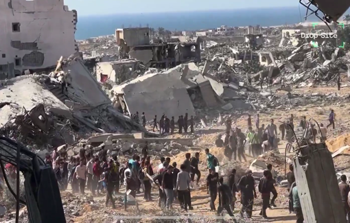 Thumbnail preview image for the video titled: Aid seekers run away from gunfire near a GHF site