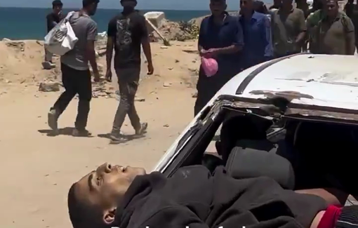 Thumbnail preview image for the video titled: Young man's body carted over the hood of a car after being killed at a GHF aid site