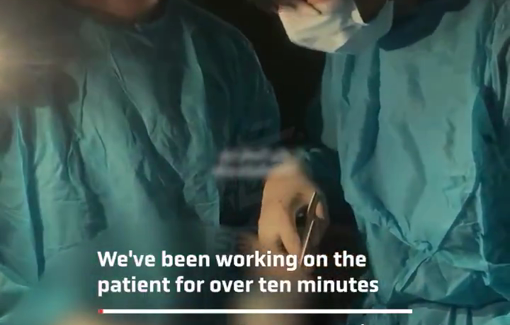 Thumbnail preview image for the video titled: Surgeons operate under phone flashlights amid Israeli blockade
