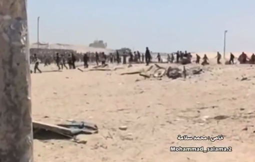 Thumbnail preview image for the video titled: Aid seekers move under Israeli tank, bulldozer and gunfire around the GHF site in Al-Shakoush, Rafah