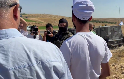 Thumbnail preview image for the video titled: International not allowed by Israeli soldiers to enter Masafer Yatta and visit Basel Adra home