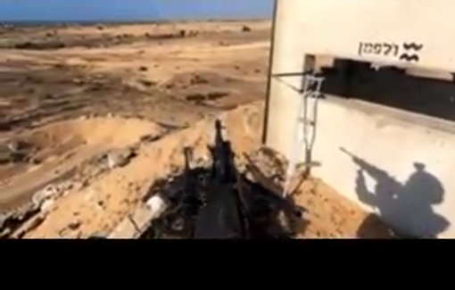 Thumbnail preview image for the video titled: IDF soldier films himself firing his rifle at a Rafah GHF site