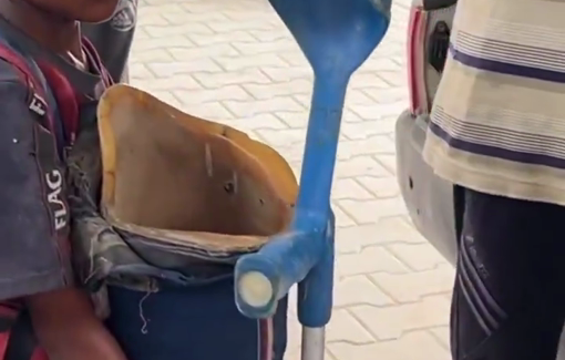 Thumbnail preview image for the video titled: Child holds his injured father's prosthetic leg after another aid massacre in Gaza City