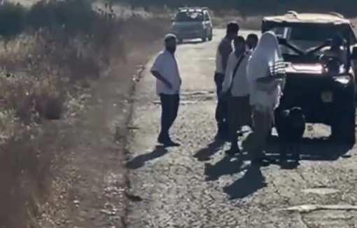 Thumbnail preview image for the video titled: Armed Israeli settlers entered land of al-Mughayir village on Yom Kippur to prevent Palestinians from harvesting their olives