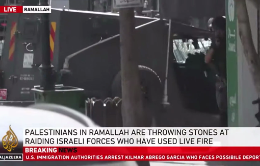 Thumbnail preview image for the video titled: Israeli raid on Ramallah raid: soldiers aiming their weapons directly at civilians and journalists