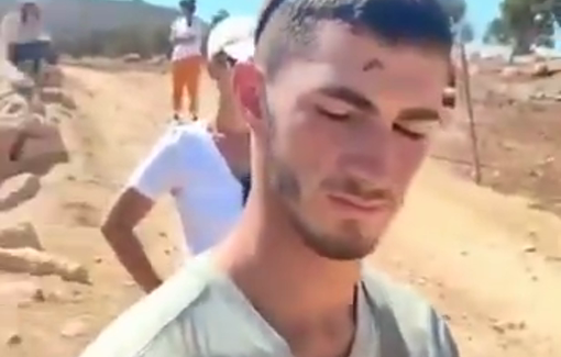 Thumbnail preview image for the video titled: Religious Israeli soldier harasses and doxxes activists protecting Duma community