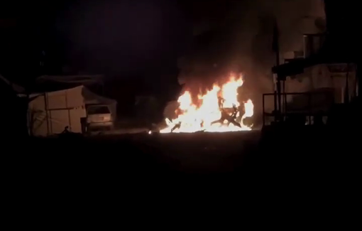 Thumbnail preview image for the video titled: Civilian car on fire following an Israeli strike next to Al-Shifa hospital