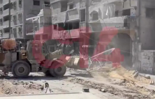 Thumbnail preview image for the video titled: Israeli wheeled loader mounted with flame thrower incinerates buildings in Gaza City