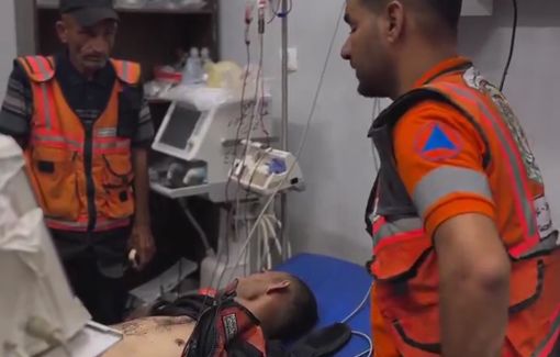 Thumbnail preview image for the video titled: Civil Defense Worker injured during Israeli double strike on Al‑Falah School