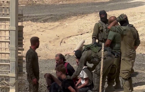 Thumbnail preview image for the video titled: Israeli activists protest at Gaza fence, demanding an end to the genocide and release of flotilla activists