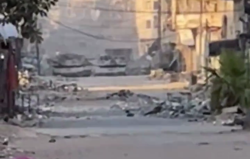 Thumbnail preview image for the video titled: Israeli tanks close in on populated area in Al-Nasr Street, Gaza City