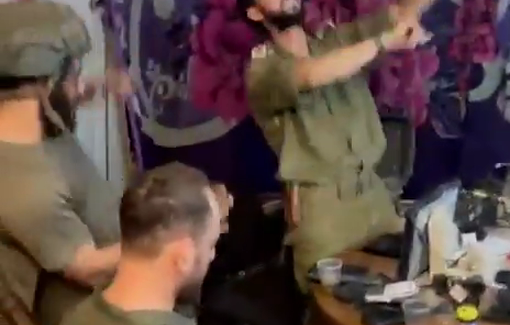 Thumbnail preview image for the video titled: Israeli soldiers dance during Sukkot holiday in the home of displaced/murdered Palestinians in Khan Younis