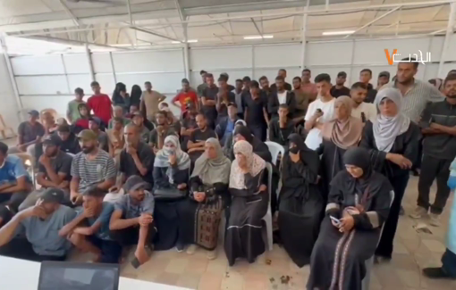 Thumbnail preview image for the video titled: Families of missing Palestinians' watch with horror mutilated dead bodies as they try to recognize their loved ones among them