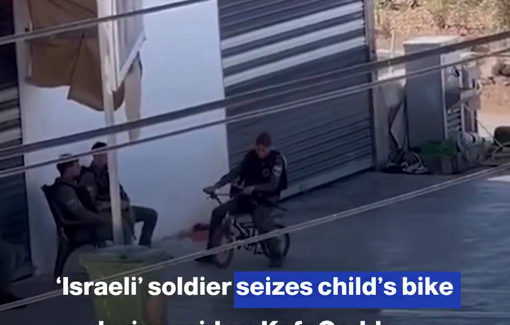 Thumbnail preview image for the video titled: An Israeli soldier seizes child’s bike during raid on Kafr Qaddum