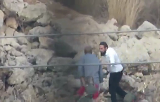 Thumbnail preview image for the video titled: Israeli settler and three soldiers taking turns beating, slapping, and assaulting Ahmad Shakarneh 65 y/o