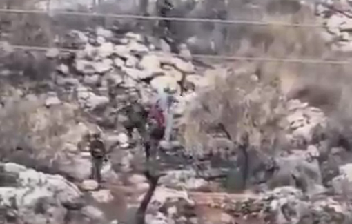 Thumbnail preview image for the video titled: Israeli settler and three soldiers taking turns beating, slapping, and assaulting Ahmad Shakarneh 65 y/o