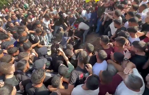 Thumbnail preview image for the video titled: Large crowds are taking part in the funeral procession of Jamil Atef Hanani killed by Isreli soldiers