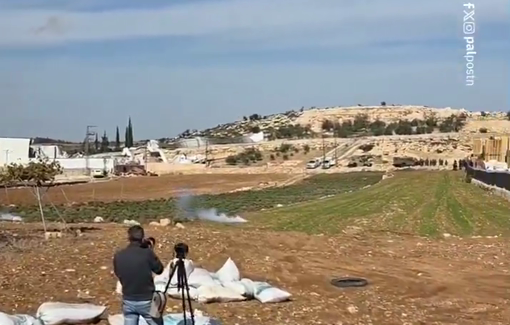 Thumbnail preview image for the video titled: Israeli forces fire tear gas canisters at Palestinian journalists while covering the demolition of a factory in Beit Ula