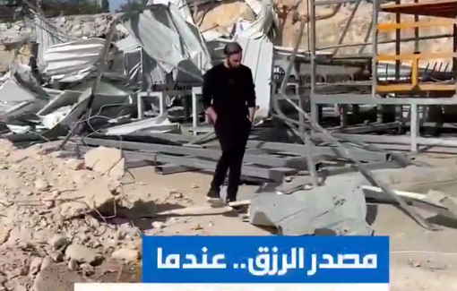 Thumbnail preview image for the video titled: A Palestinian inspects his factory and source of income, reduced to rubble by Israeli authorties in Beit Ula
