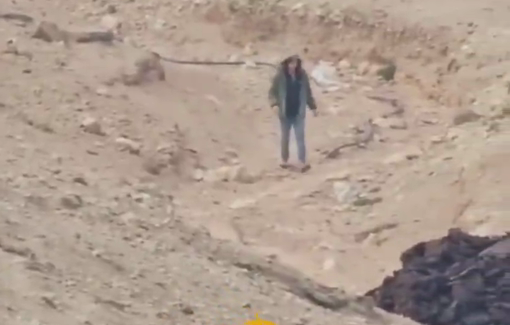 Thumbnail preview image for the video titled: Teen settlers chase sherperd in Al-Hathoura beduin commmunity near Han Al-Ahmar, east of Jerusalem