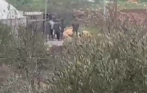 Thumbnail preview image for the video titled: Israeli forces arrest three young men near one of the entrances to the town of Beit Ummar