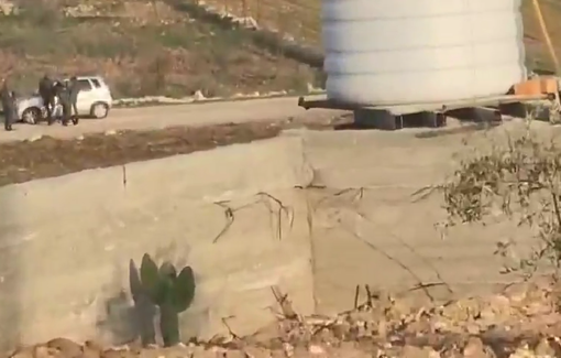 Thumbnail preview image for the video titled: Israeli soldiers arrest a woman and her child and confiscate their vehicle in the Al-Khalidiyah area, east of the city of Yatta