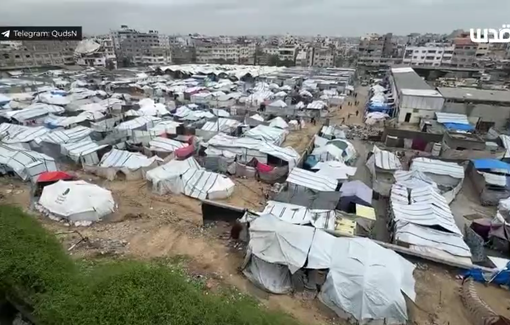 Thumbnail preview image for the video titled: In Gaza's displacement camps, worn-out tents are flooded by rain, forcing families to endure harsh winter conditions