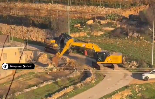 Thumbnail preview image for the video titled: Israeli bulldozers destroyed a private road leading to a house in Beit Ummar