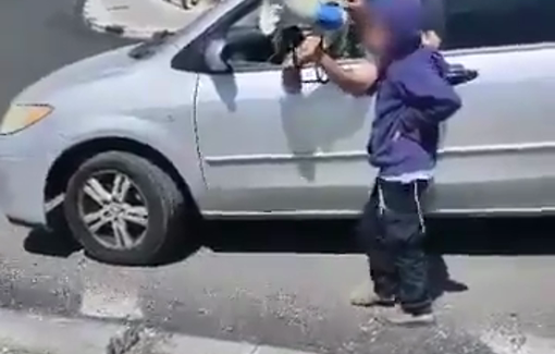 Thumbnail preview image for the video titled: The settler Amos Azaria brought his little kid to harass activist and Palestinian in Za'tara Junction