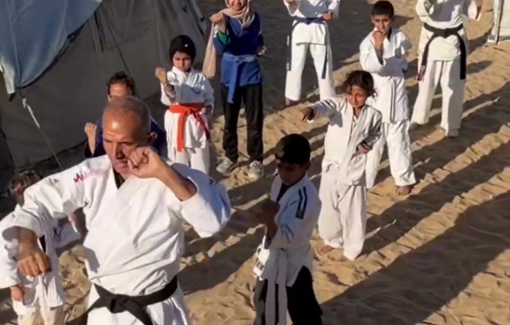 Thumbnail preview image for the video titled: Karate coach Khalil Shalqa from Gaza continues to train forcibly displaced children among the tents