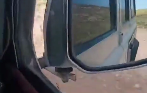 Thumbnail preview image for the video titled: Settlers chasing School bus in Wadi Sa'ir, terrorizing the children