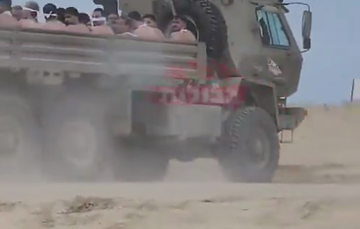 Thumbnail preview image for the video titled: 3 full transport vehicles of Gazan hostages rounded up by the Israeli army in North Gaza