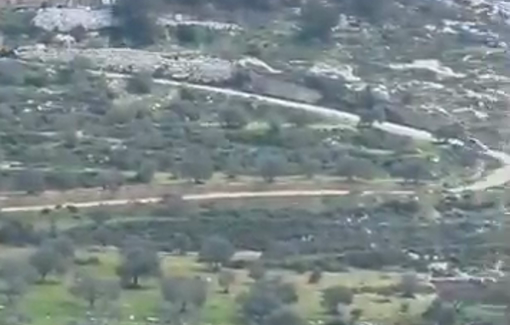 Thumbnail preview image for the video titled: Israeli settlers chase a Palestinian vehicle with ATV while open fire on it in the Jabal Al-Arma area