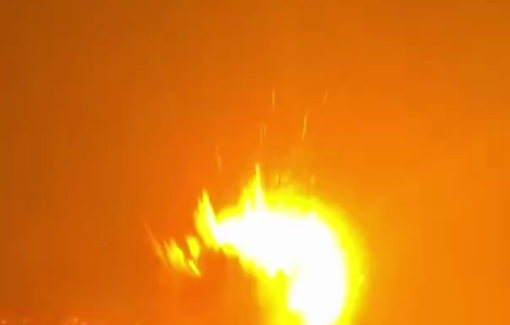 Thumbnail preview image for the video titled: Israeli warplanes struck a building beside displacement tents in the Al-Ansar area, igniting fires and damaging the surroundings